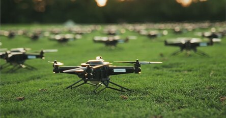 An image of NLDS drones laid out on the grass before a show. An image of NLDS drones laid out on the grass before a show.
