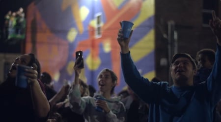 An image of a crowd cheering during an NLDS drone show. An image of a crowd cheering during an NLDS drone show.