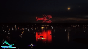 An image from an NLDS drone show featuring a lobster over Boothbay Harbor that appeared in the NLDS Windjammer Days show. An image from an NLDS drone show featuring a lobster over Boothbay Harbor that appeared in the NLDS Windjammer Days show.