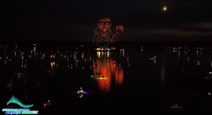 An image from an NLDS drone show featuring a waving timber troll that appeared in the NLDS Windjammer Days show. An image from an NLDS drone show featuring a waving timber troll that appeared in the NLDS Windjammer Days show.