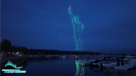 An image from an NLDS drone show featuring the Statue of Liberty for a 4th of July celebration.