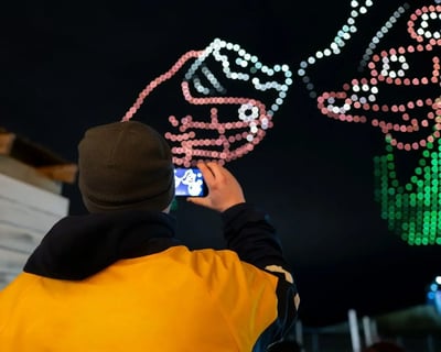 An image from the BCI Faith Celebration featuring a closeup of a spectator.