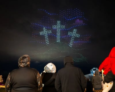 An image from the BCI Faith Celebration featuring a hill with crosses.
