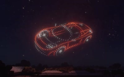 An image from the Silicon Valley Tesla Owners Club show featuring a Tesla car.
