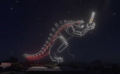 An image from the Silicon Valley Tesla Owners Club show featuring Godzilla.
