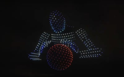 An image from the Silicon Valley Tesla Owners Club show featuring Tesla's robot "Optimus."