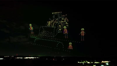An image from the Timber Wolf 10-year Anniversary show featuring a construction crew.