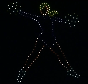 Drone show depicting a cheerleader at a sports game.