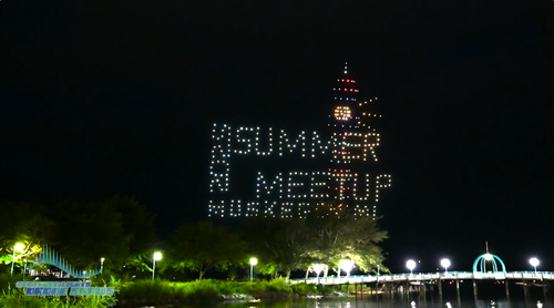 An image from an NLDS drone show showing a festival's logo. An image from an NLDS drone show showing a festival's logo.