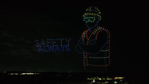 An image from an NLDS drone show depicting a construction worker with the company's tagline: Safety Always. An image from an NLDS drone show depicting a construction worker with the company's tagline: Safety Always.
