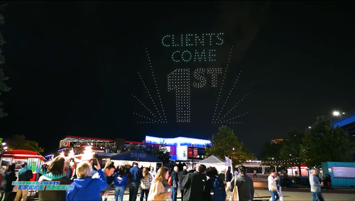 An image from an NLDS drone show depicting the words "Clients come 1st" for a Baird Financial Services show. An image from an NLDS drone show depicting the words "Clients come 1st" for a Baird Financial Services show.