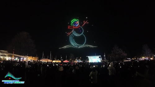 An NLDS drone show depicting a snowman during a winter festival. An NLDS drone show depicting a snowman during a winter festival.