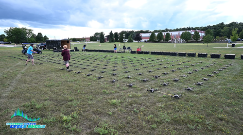 An image from before an NLDS drone show depicting the ground crew performing a set up.