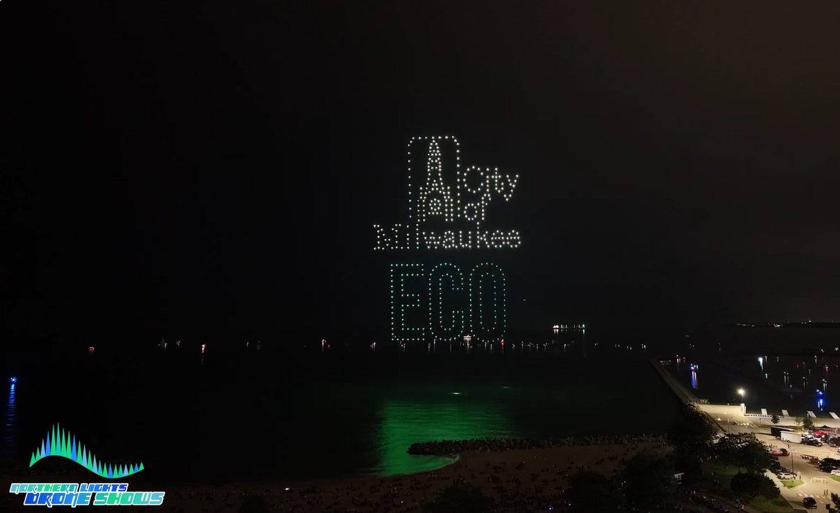 An image from a Northern Lights Drone Shows show depicting the logo and name of a local entity from Milwaukee that organized the show. An image from a Northern Lights Drone Shows show depicting the logo and name of a local entity from Milwaukee that organized the show.