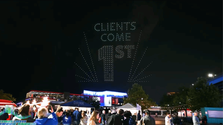 An image of an NLDS drone show depicting a slogan of a company.