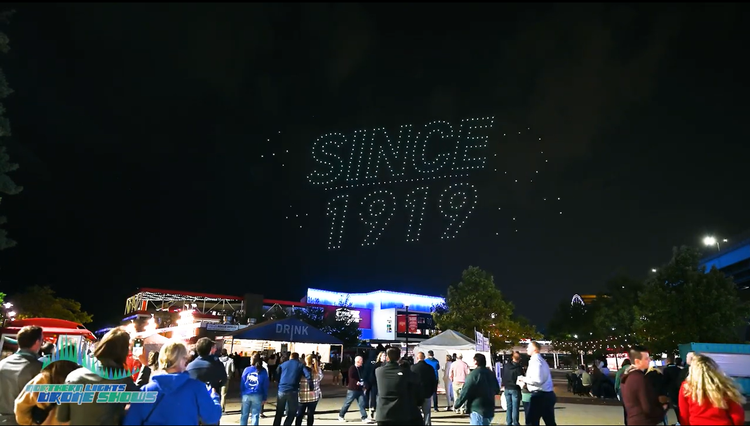 An image from an NLDS drone show above a festival ground.