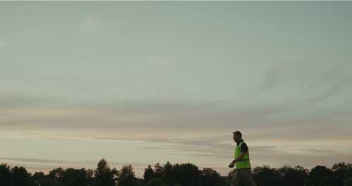 An image depicting an NLDS flight crew member walking during the set-up process.