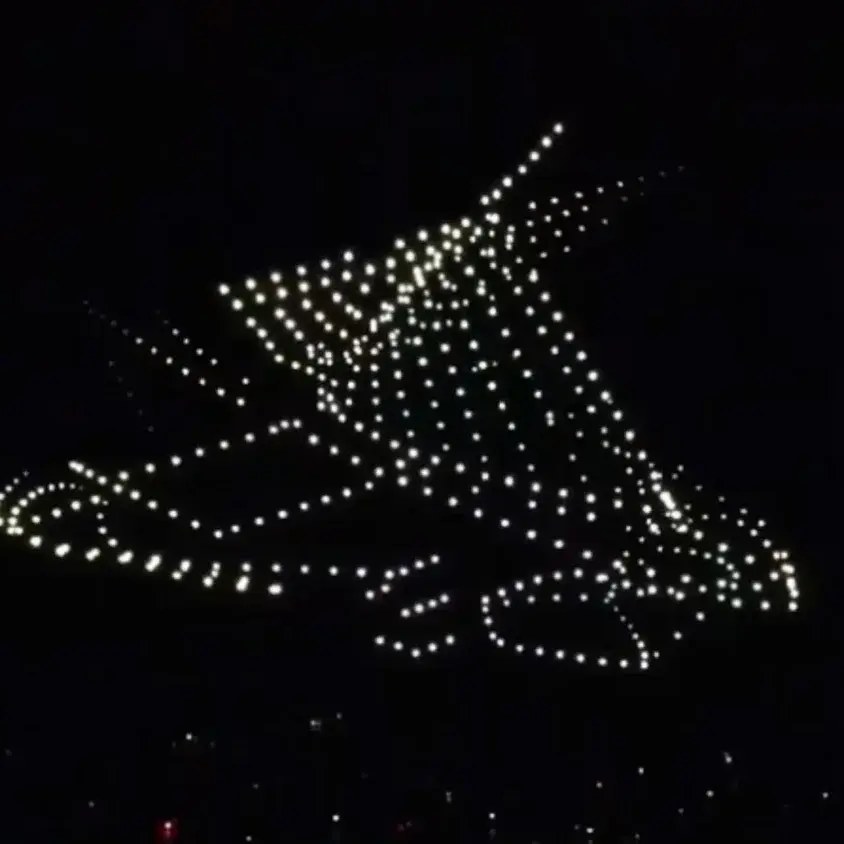 An image from an NLDS drone show featuring a Milwaukee building formation over the city skyline. An image from an NLDS drone show featuring a Milwaukee building formation over the city skyline.