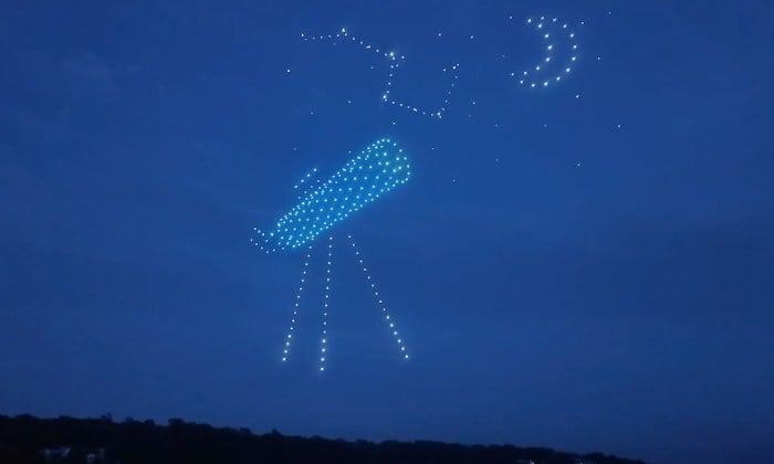 An image from an NLDS drone show featuring a telescope that appeared in the NLDS Lake Geneva Fourth of July show. An image from an NLDS drone show featuring a telescope that appeared in the NLDS Lake Geneva Fourth of July show.