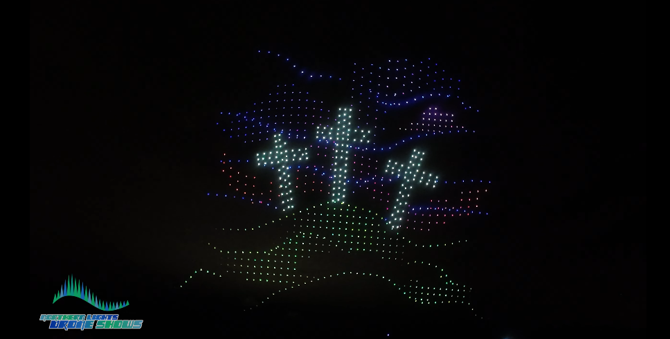 An image from an NLDS drone show featuring a hill with crucifixes.