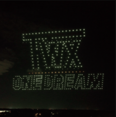 An image from the Timber Wolf 10-year Anniversary show featuring the company's logo.