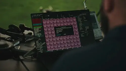 An image from an NLDS drone show of our lead pilot overseeing the synchronization process prior to a flight.