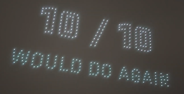 An image from an NLDS drone show depicting the words "19/10 Would Do Again"