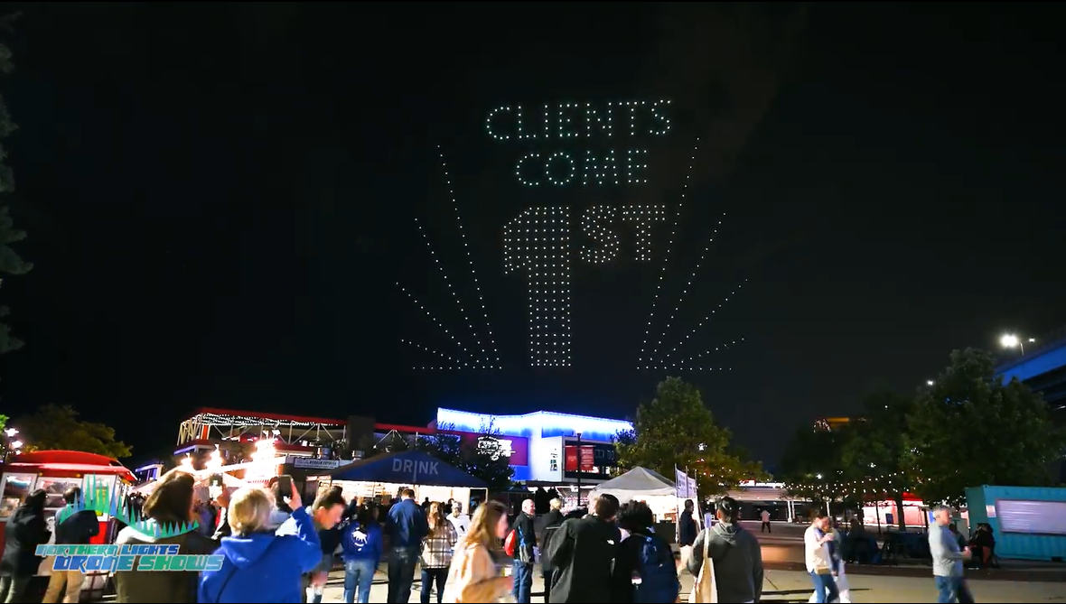 An image from the NLDS Baird show featuring the message "Clients Come 1st."