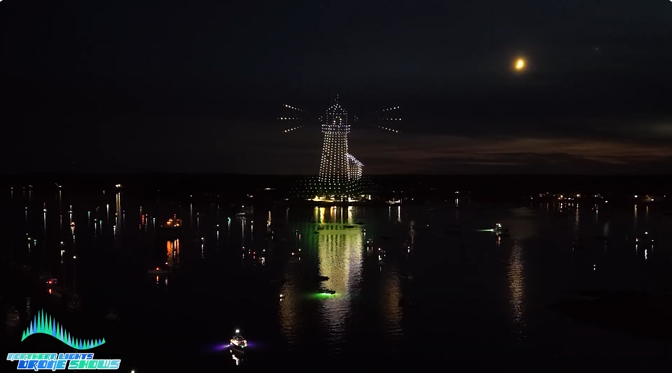 An image from an NLDS drone show depicting a local lighthouse for a crowd of locals. An image from an NLDS drone show depicting a local lighthouse for a crowd of locals.