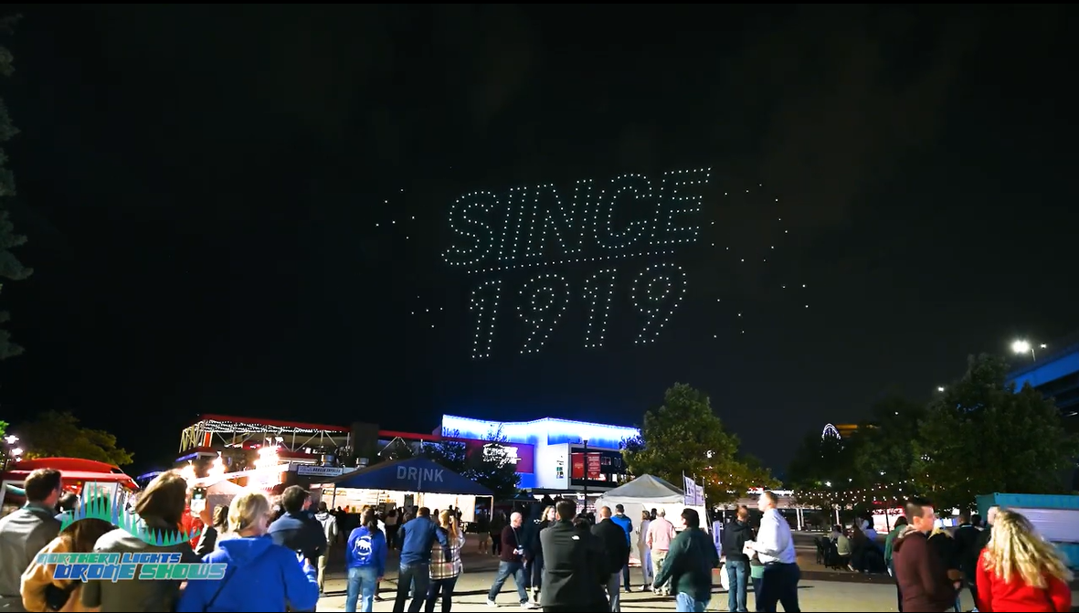 An image from an NLDS drone show depicting an anniversary message.