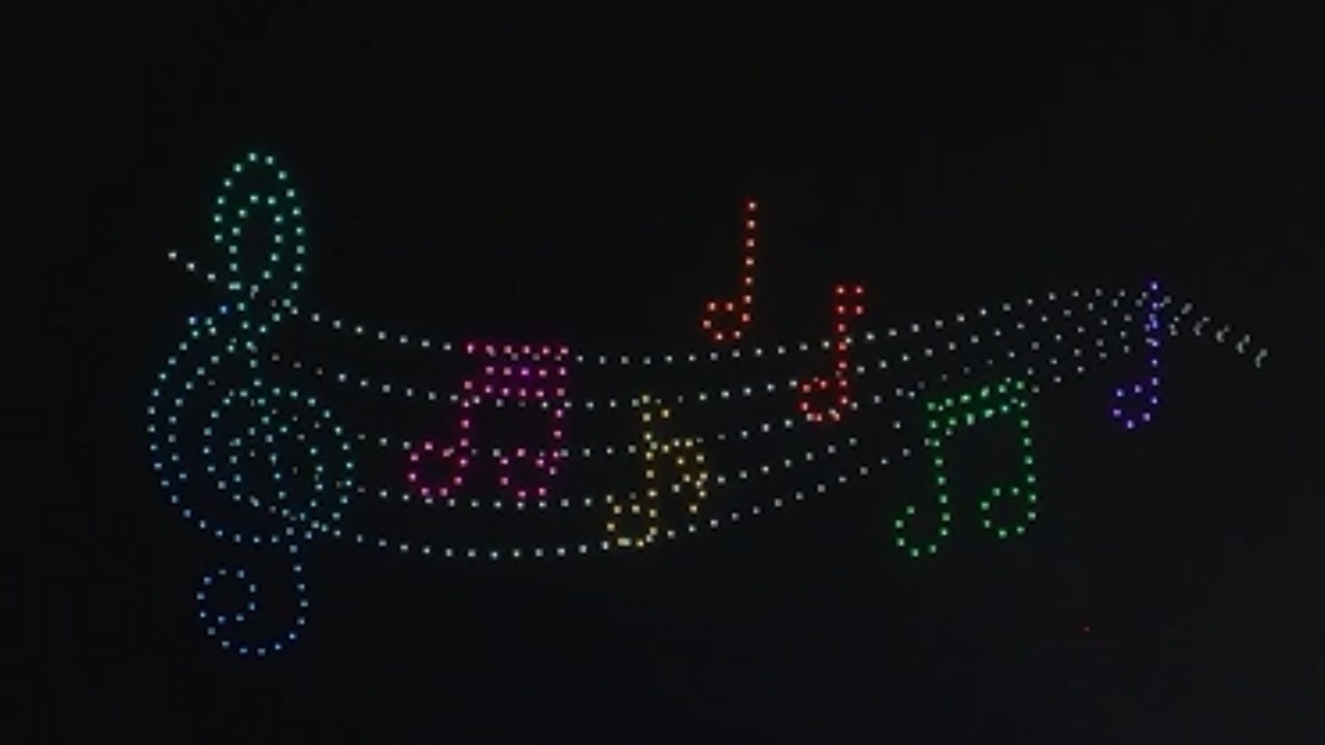 An image from an NLDS drone show depicting a bar of music.