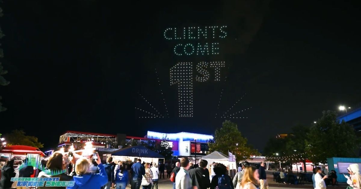 An image from an NLDS drone show featuring the tagline "Clients Come 1st." An image from an NLDS drone show featuring the tagline "Clients Come 1st."