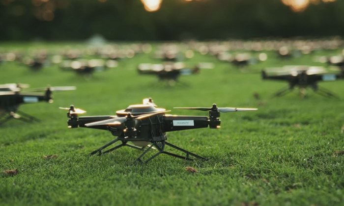 An image of NLDS drones laid out on a field before a show.
