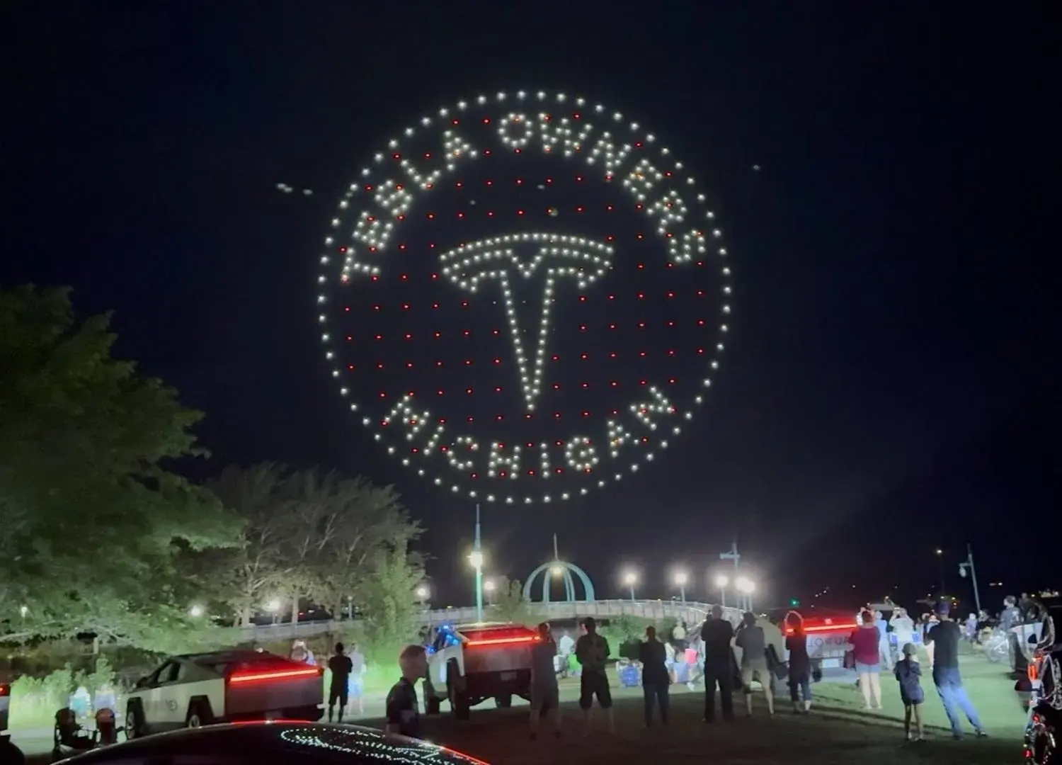 An image from the Muskegon Tesla Owners show featuring the Tesla logo.