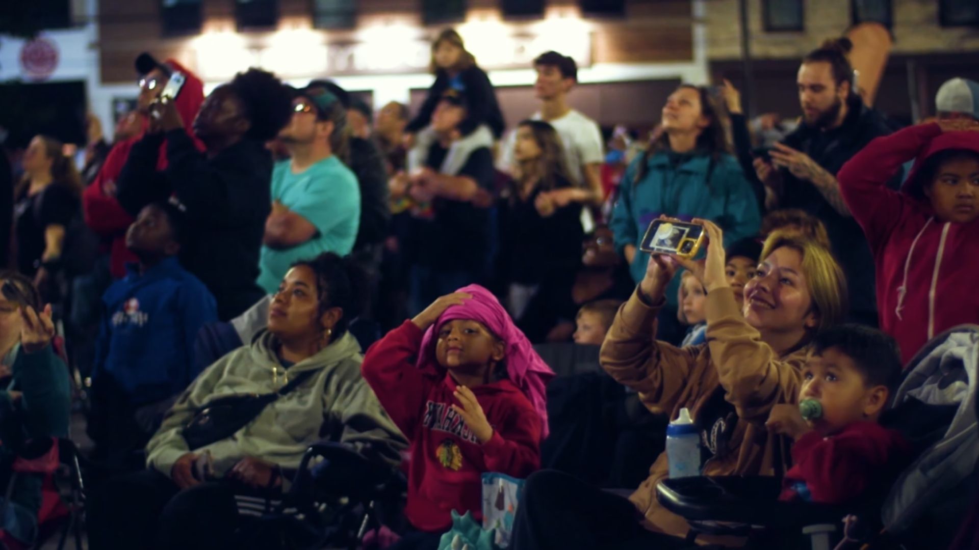 An image of a crowd watching an NLDS drone show.