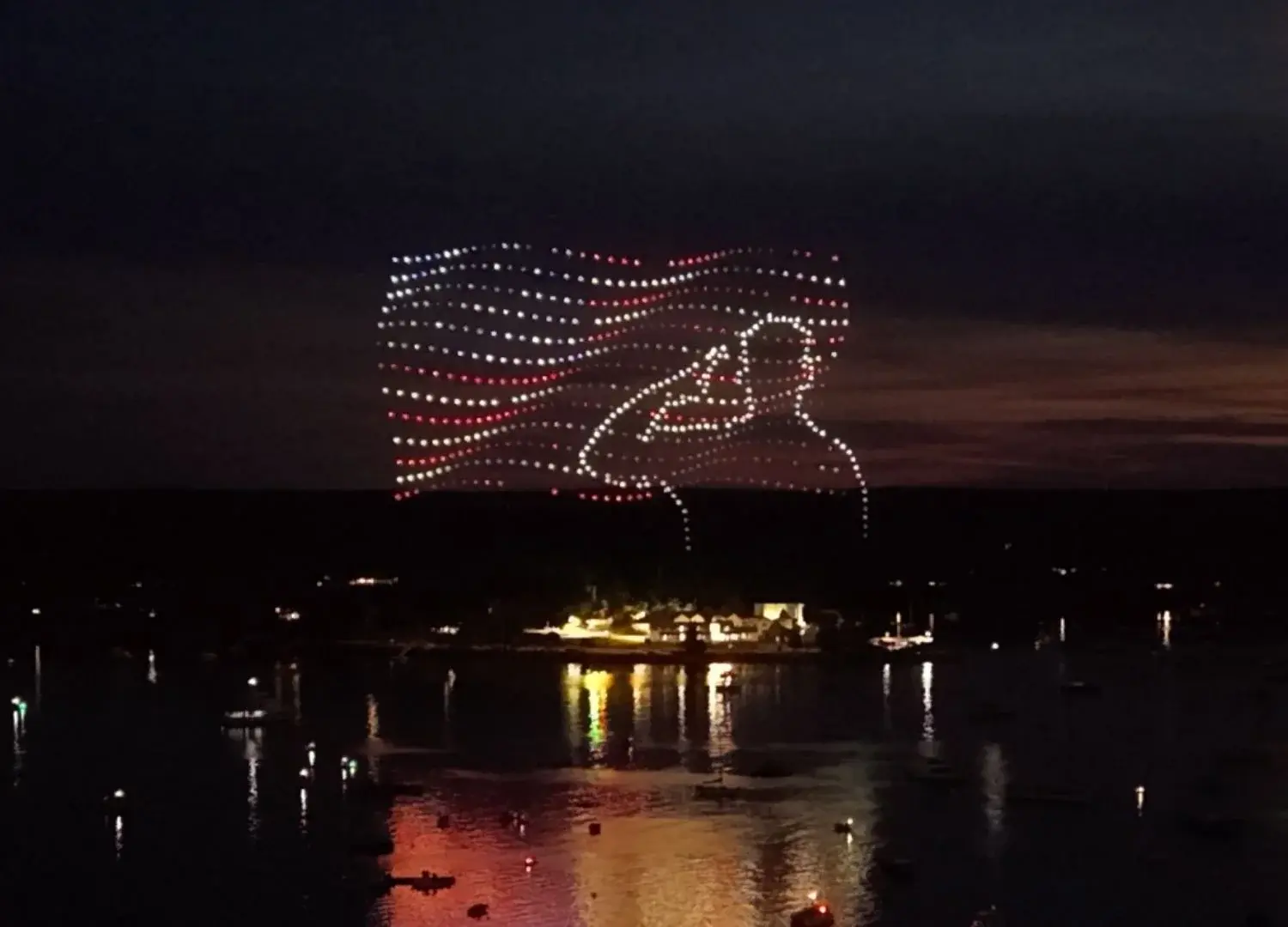 An image of a soldier saluting in front of an American flag at the Windjammer Days NLDS show. An image of a soldier saluting in front of an American flag at the Windjammer Days NLDS show.