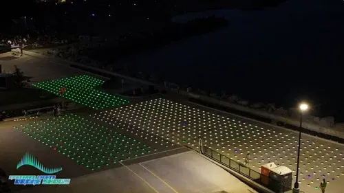 An image of before an NLDS drone show depicting all of our drones lined up squarely in a grid.